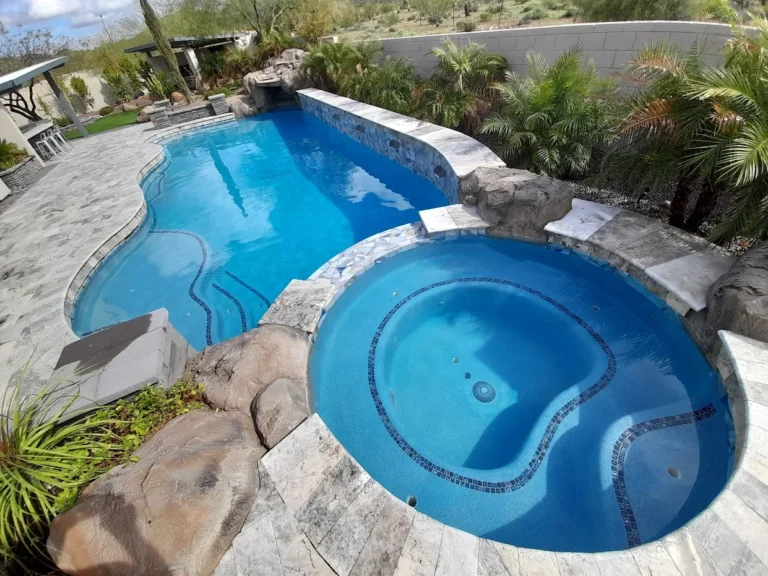 Clean pool and spa with natural rock water feature