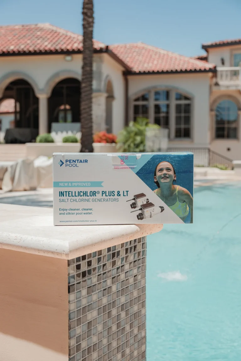 Pentair IntelliChlor salt chlorine generator beside a pool